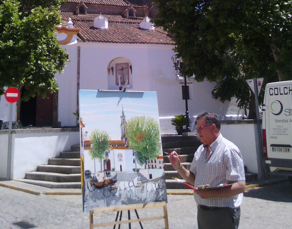 Cristóbal Valle pintando la Catedral de la Sierra en Hinojosa del Duque