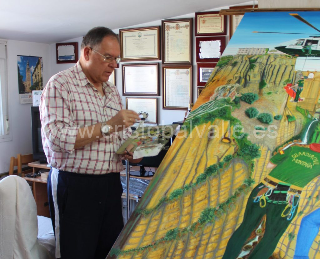 Cristobal Valle retocando Rescate en el Tajo de Ronda